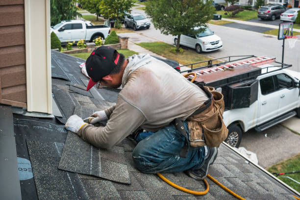 Professional Roofing technician working in Burlington, MA